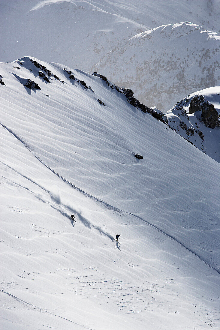 Skiers in deep powder snow, Parsenn, Davos, Canton of Grisons, Switzerland