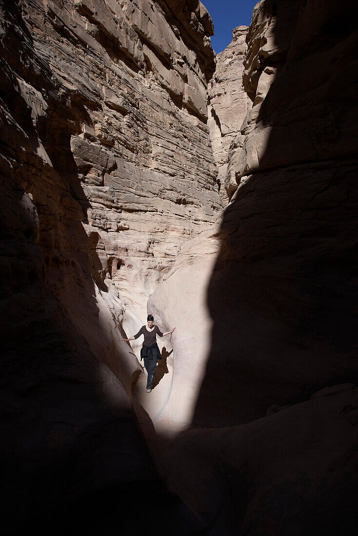 Woman at coloured canyon, Sinai peninsula, Egypt, Africa