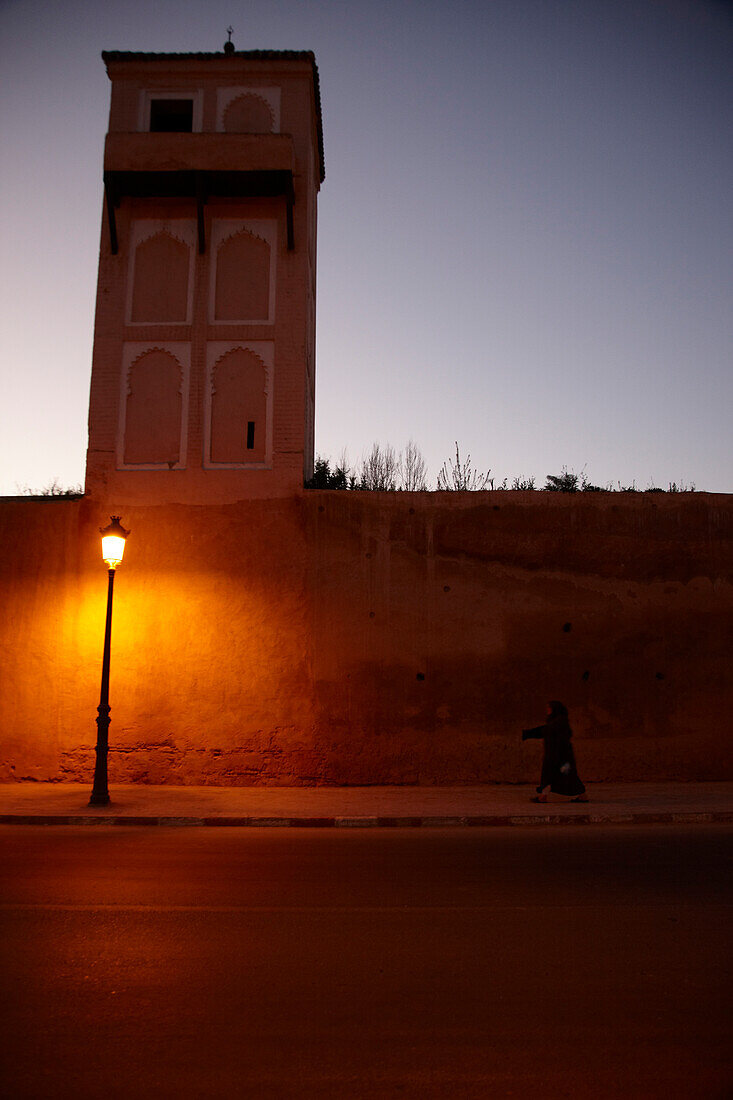 Street lamp in front of mud wall, Meknes, Morocco, Africa