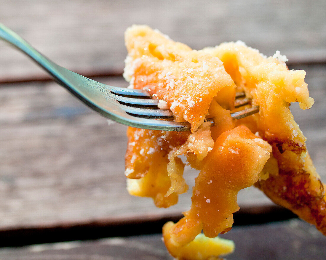 Kaiserschmarrn, sugared raisin pancake on a fork, Molterau Hut, Region of Hochkönig, Salzburger Land, Austria