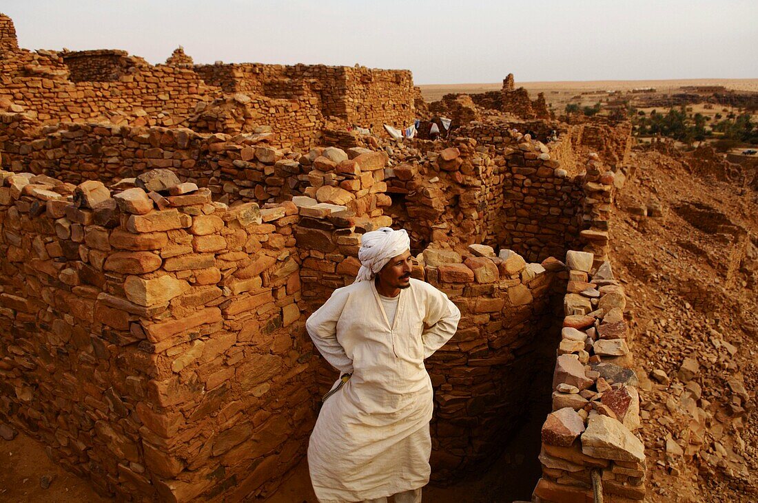 Heir of the old family founder of the city in old town, Ouadane, Adrar Plateau, Sahara desert, Mauritania