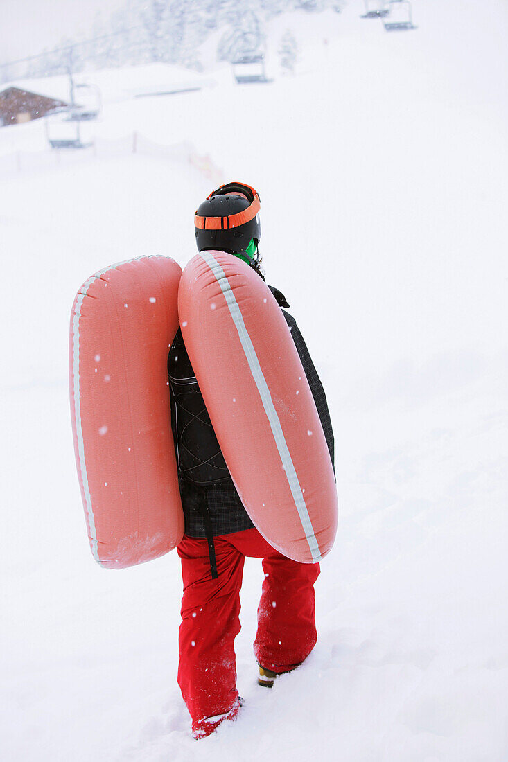 Male free skier with inflated avalanche airbag, Mayrhofen, Ziller river valley, Tyrol, Austria