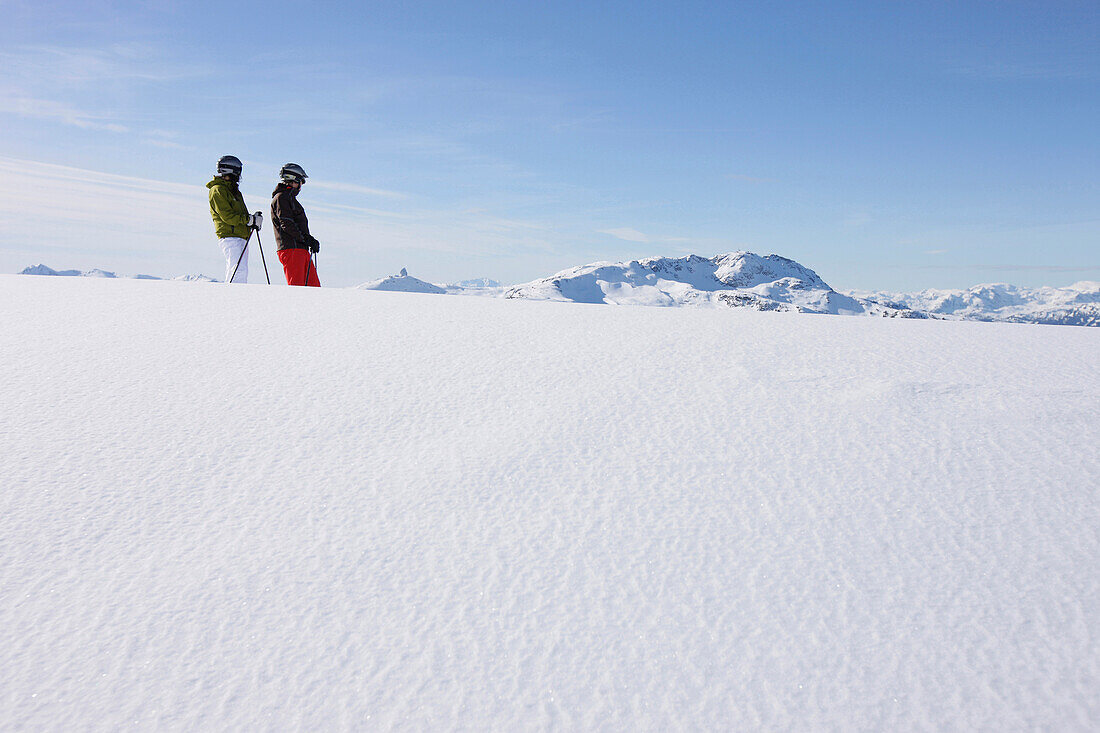 Skiers at Blackcomb Peak, British Columbia, Canada