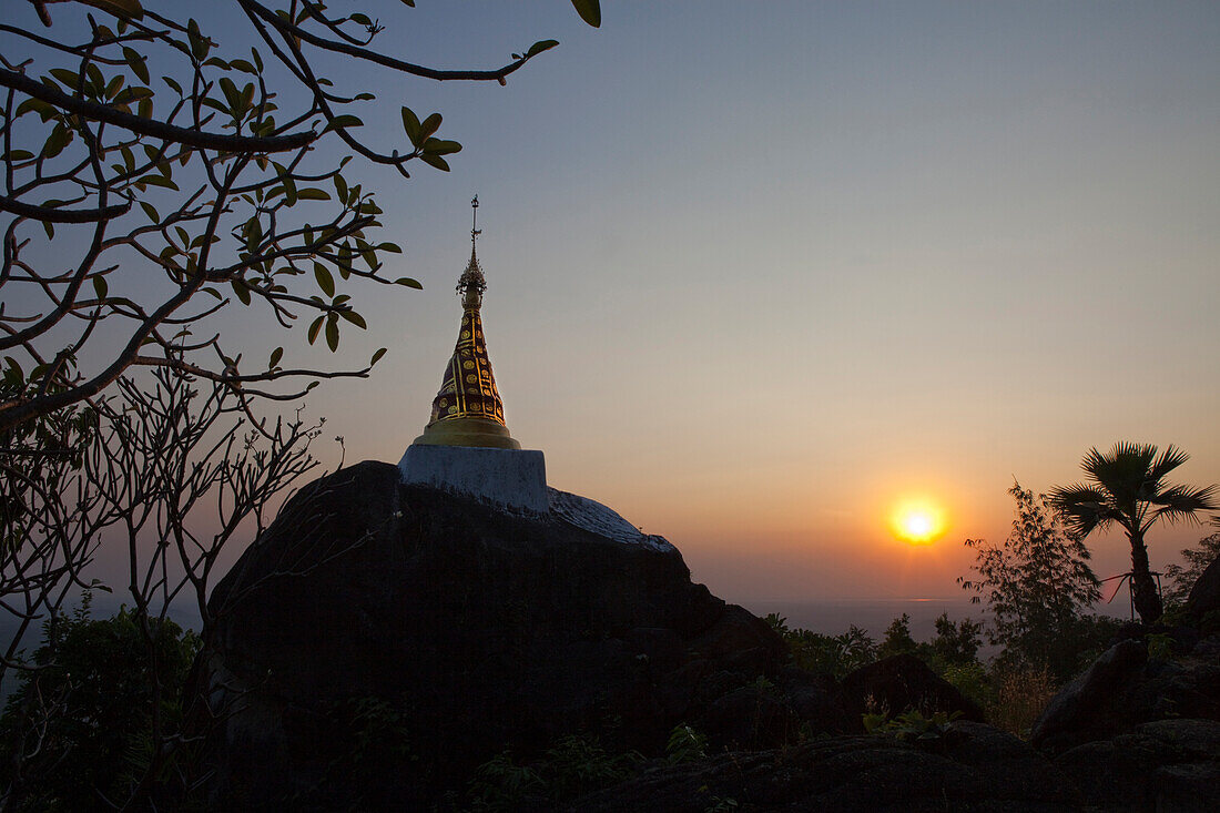 Stupa of a buddhistic monastery in Kyaikhtiyo at sunset, Mon State, Myanmar, Birma, Asia
