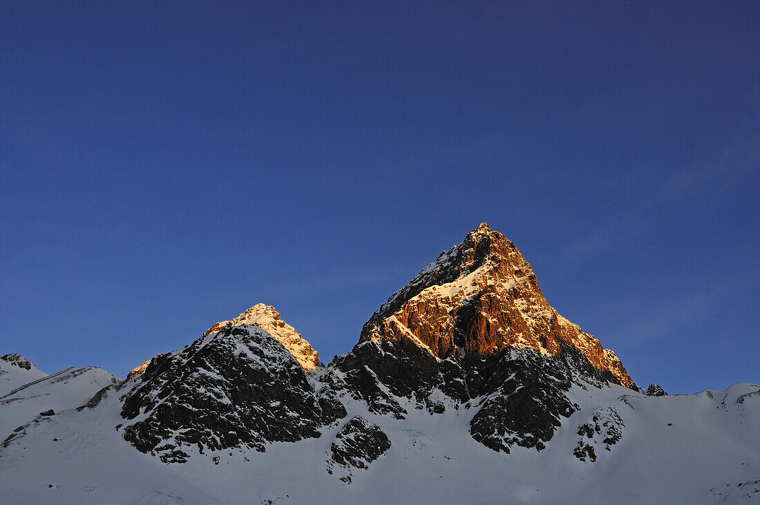 Summit of the Piz Buin in the sunlight, Engadin, Grisons, Switzerland, Europe