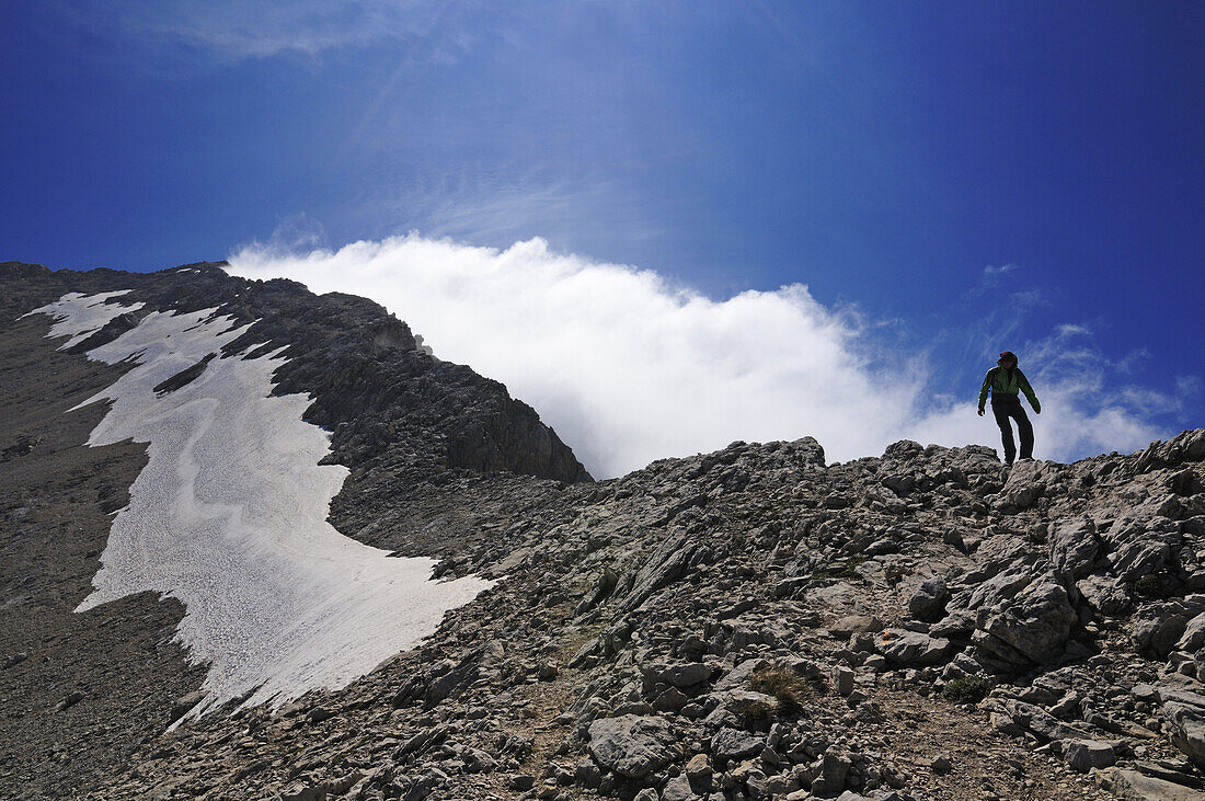 Mountaineer at west ridge of Corno Grande, Gran Sasso National Park, Abruzzi, Italy, Europe