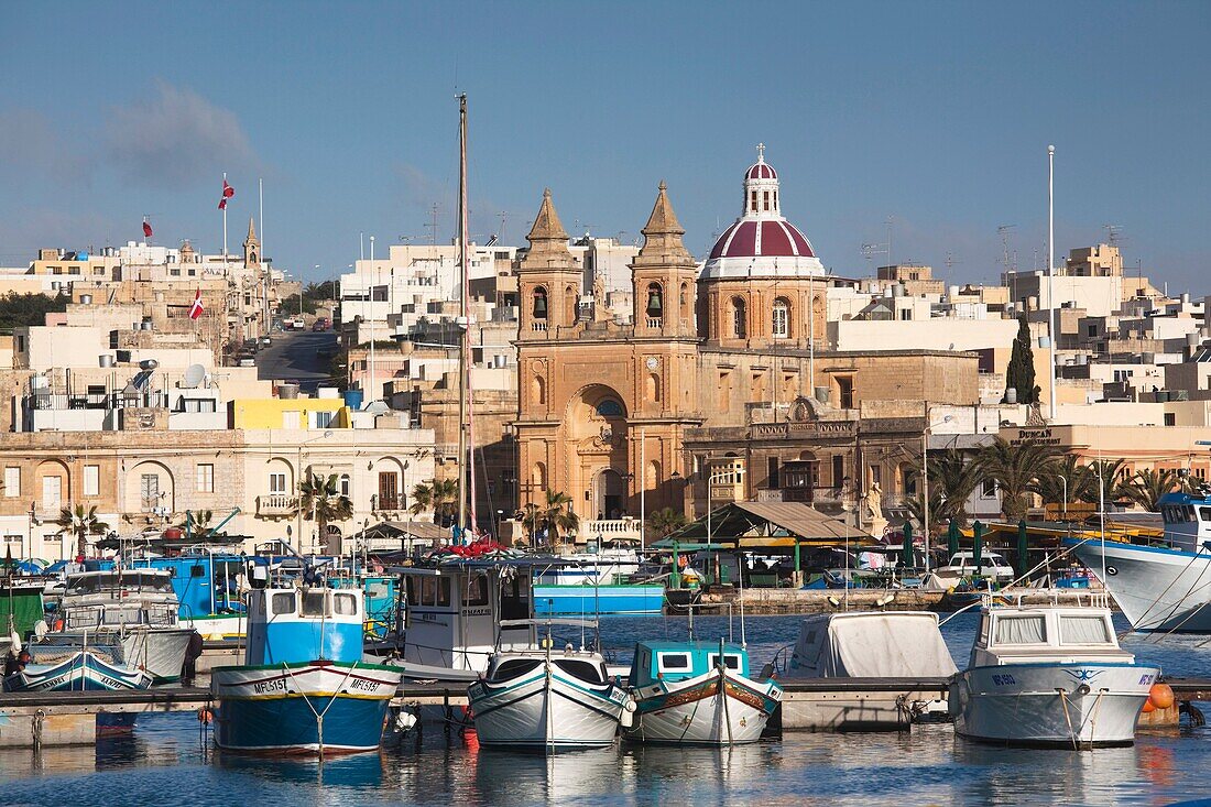 Malta, Southeast, Marsaxlokk, harbor and traditional Luzzu fishing boats