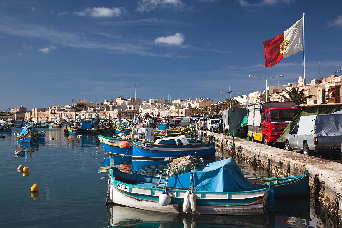 Malta, Southeast, Marsaxlokk, harbor and traditional Luzzu fishing boats