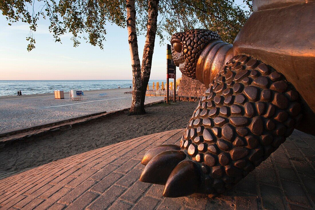 Latvia, Western Latvia, Riga Area, Jurmala, Majori Village, Majori Beach turtle statue, sunset