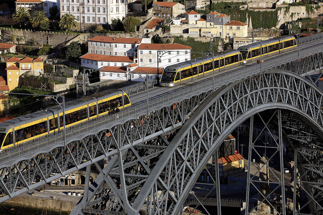 Porto Metro crossing Dom Luis I Bridge seen from Jardim do Morro, Porto, Portugal