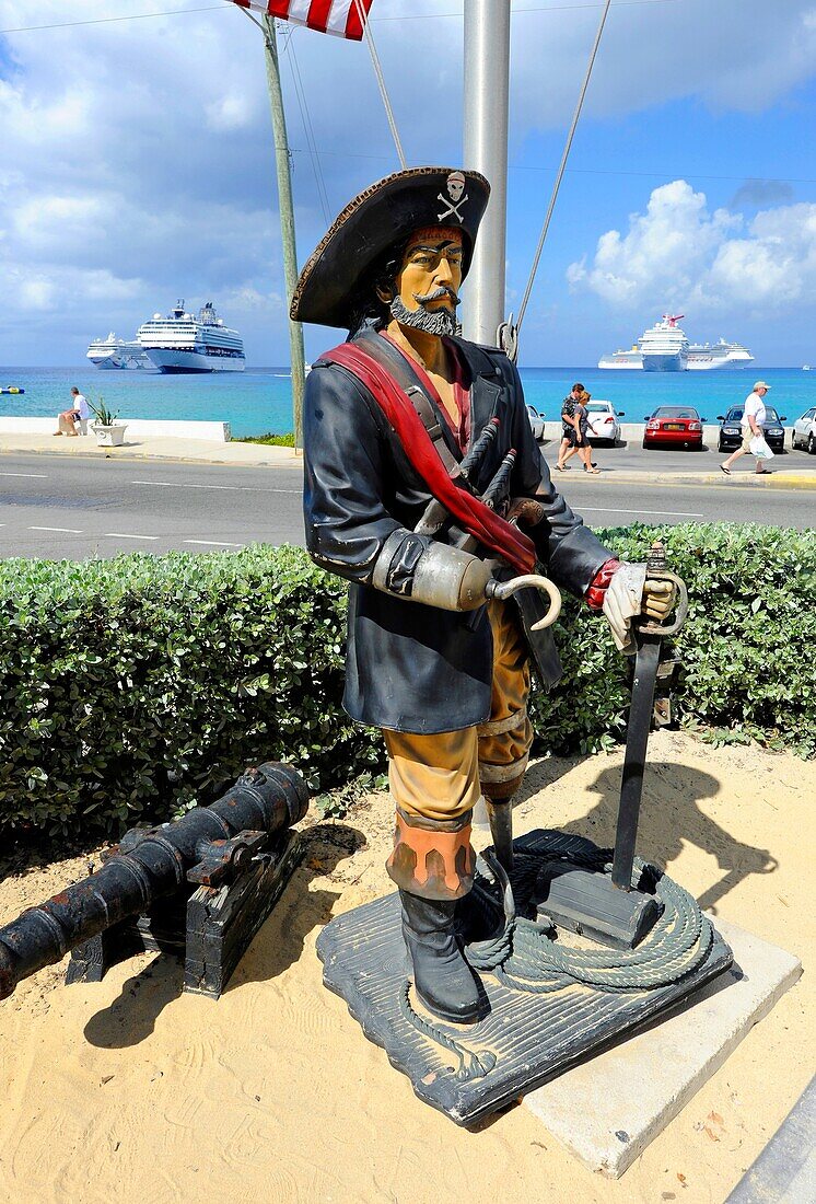 Pirate statue with flags at Tortuga Rum Cake Ship Grand Cayman Islands Caribbean Georgetown