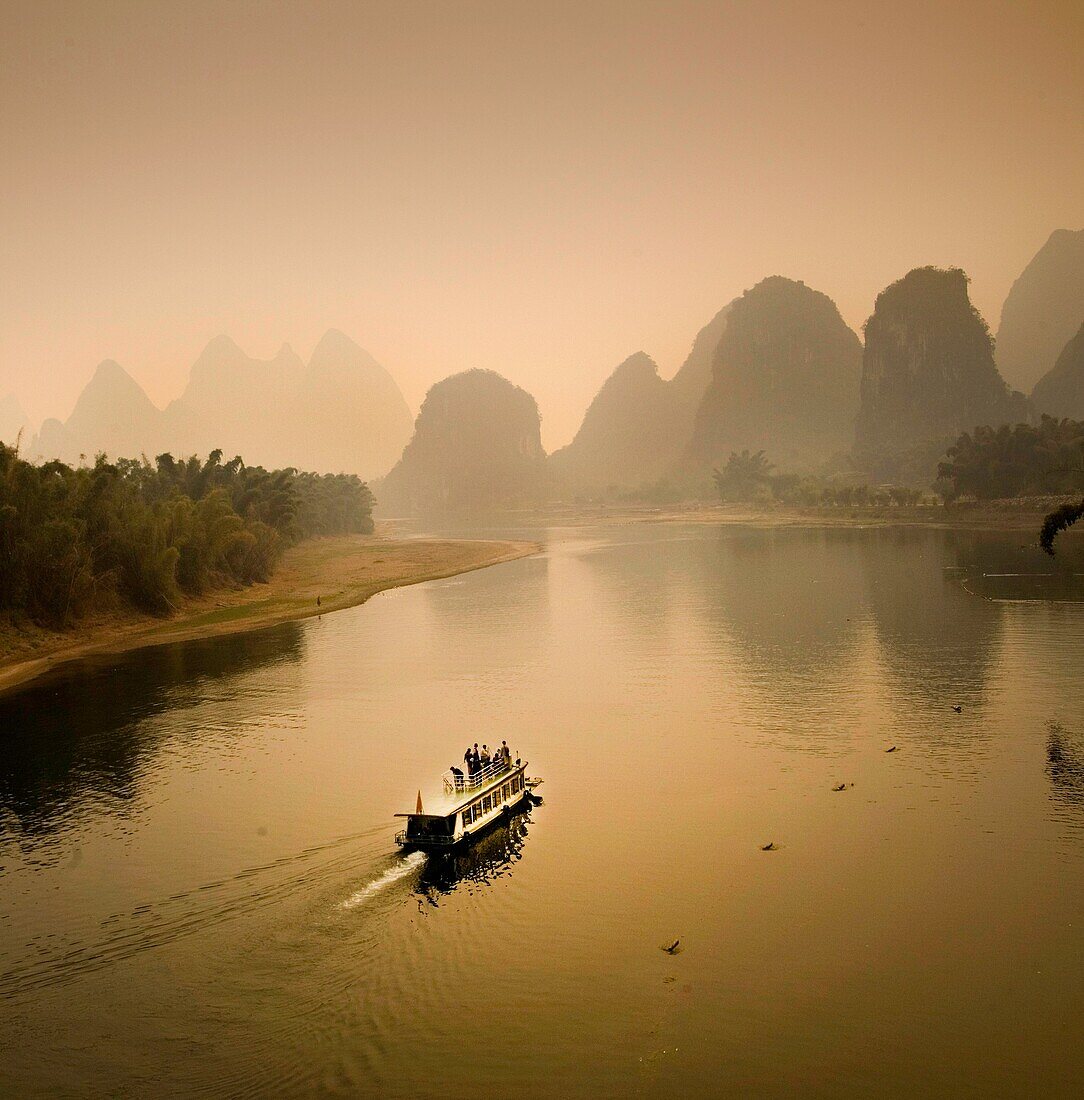 Boat on the Li River, Yangshuo county, Guilin, Guangxi Province, China