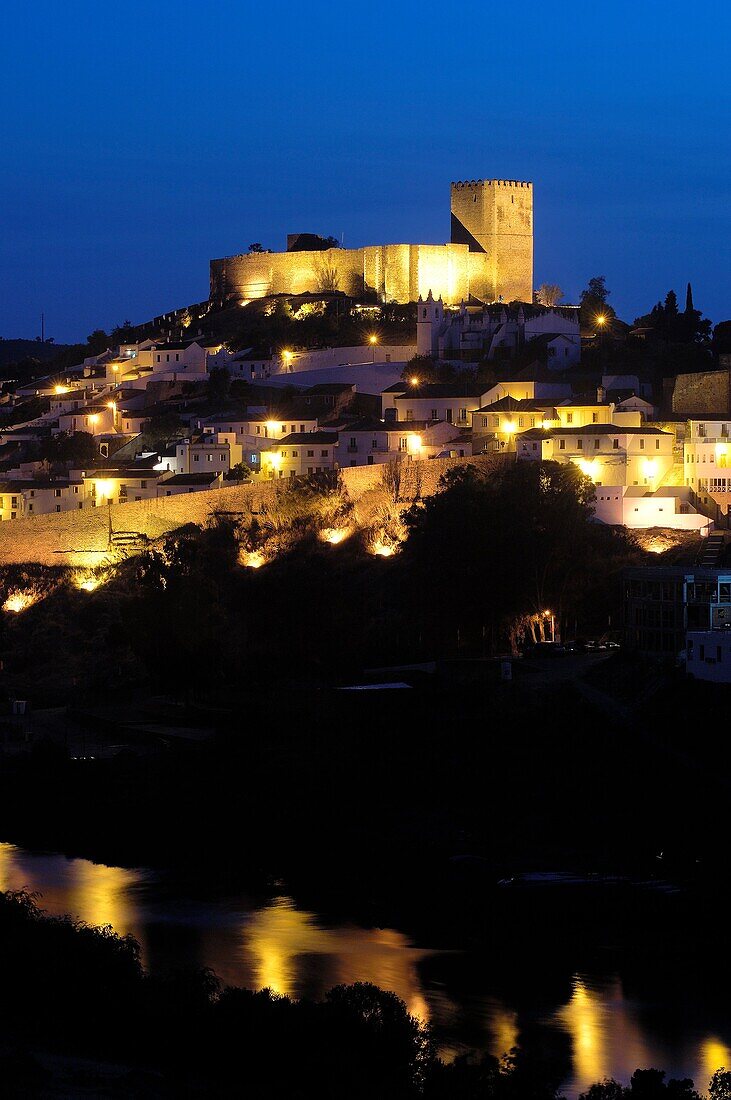 Mertola castle and Guadiana river at dusk. Alentejo, Portugal