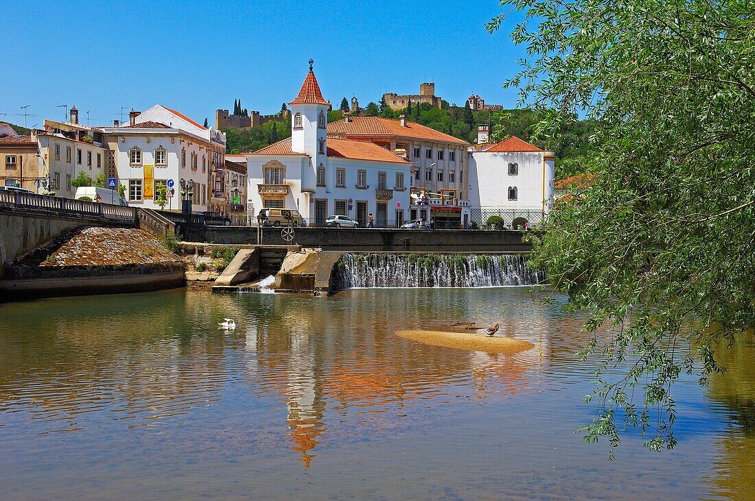 Nabão river and Castle and Convent of the Order of Christ in background, Tomar, Santarem District, Ribatejo, Portugal
