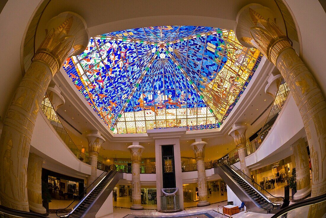 An atrium in the Wafi City Mall an Egptian themed mall topped by a stained glass pyramid, Dubai, United Arab Emirates