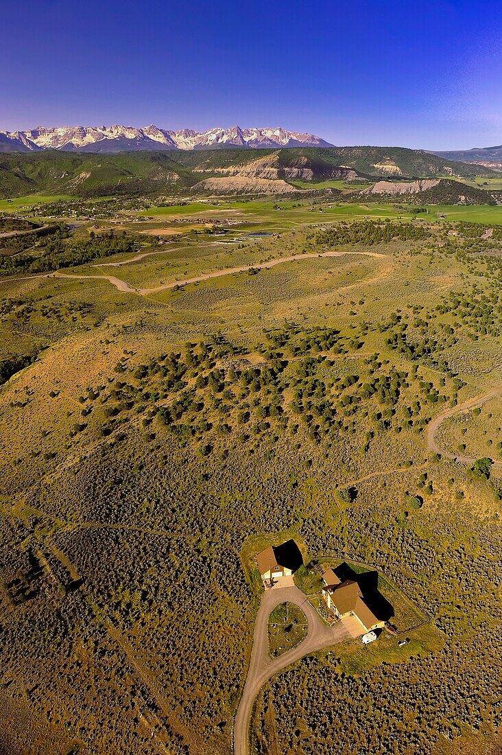 Aerial views above Ridgway, Colorado USA Sneffels Range of the San Juan Mountains in the background