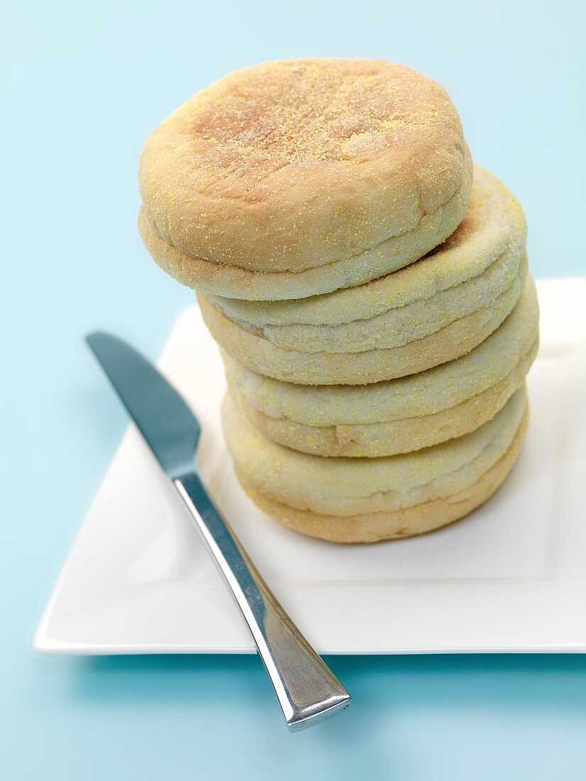 English muffins isolated against a blue background