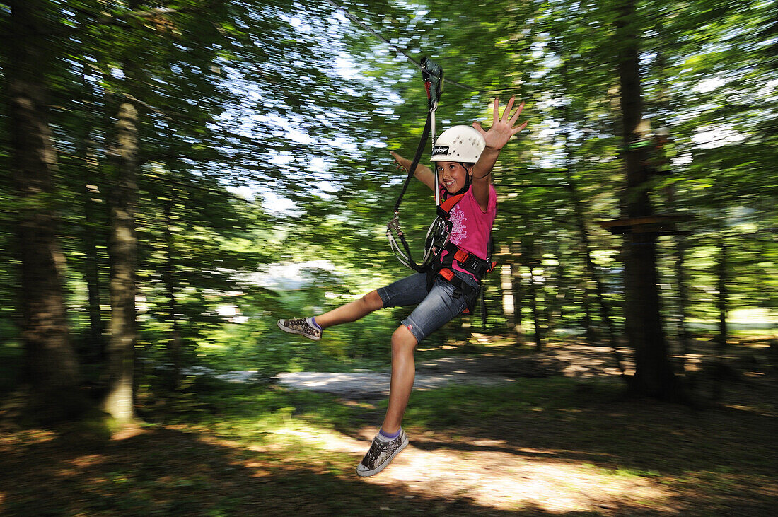 Child at high ropes course at Maserer Pass, Reit im Winkl, Chiemgau, Upper Bavaria, Bavaria, Germany, Europe