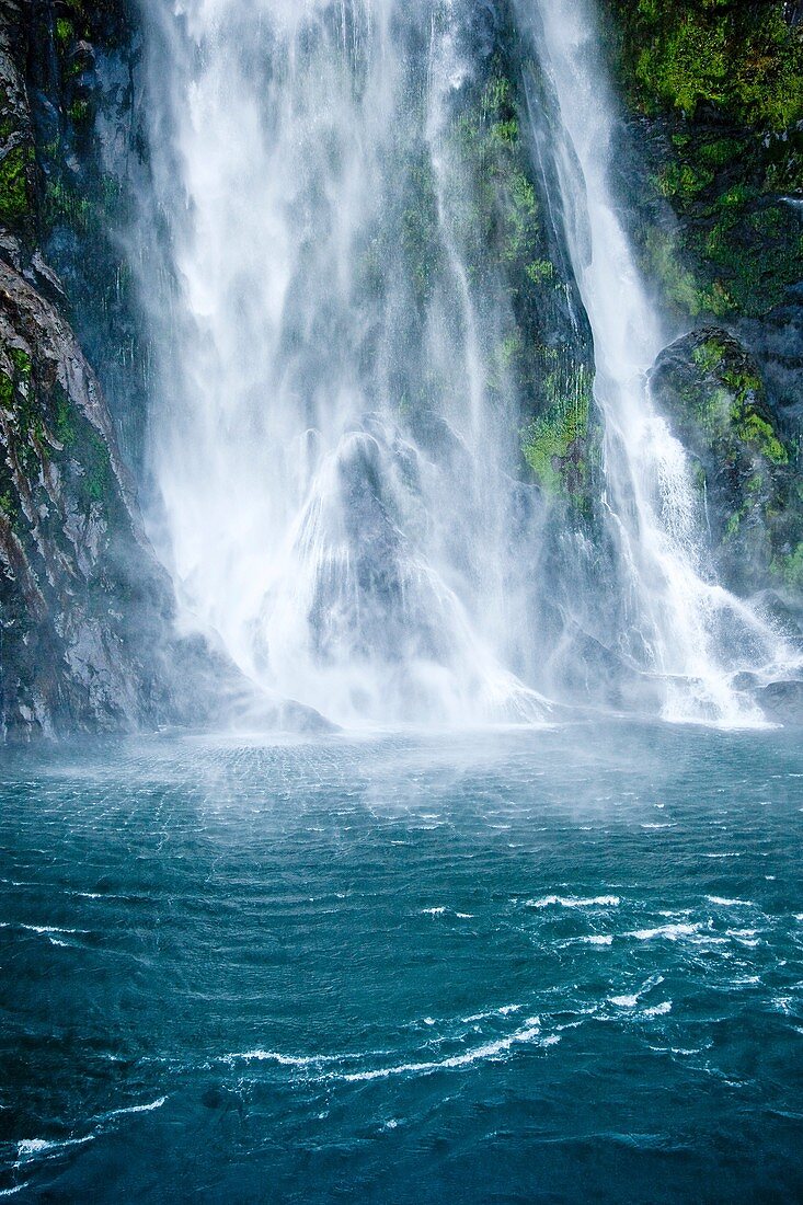 Stirling falls drops into Milford Sound, Fiordland National Park, New Zealand