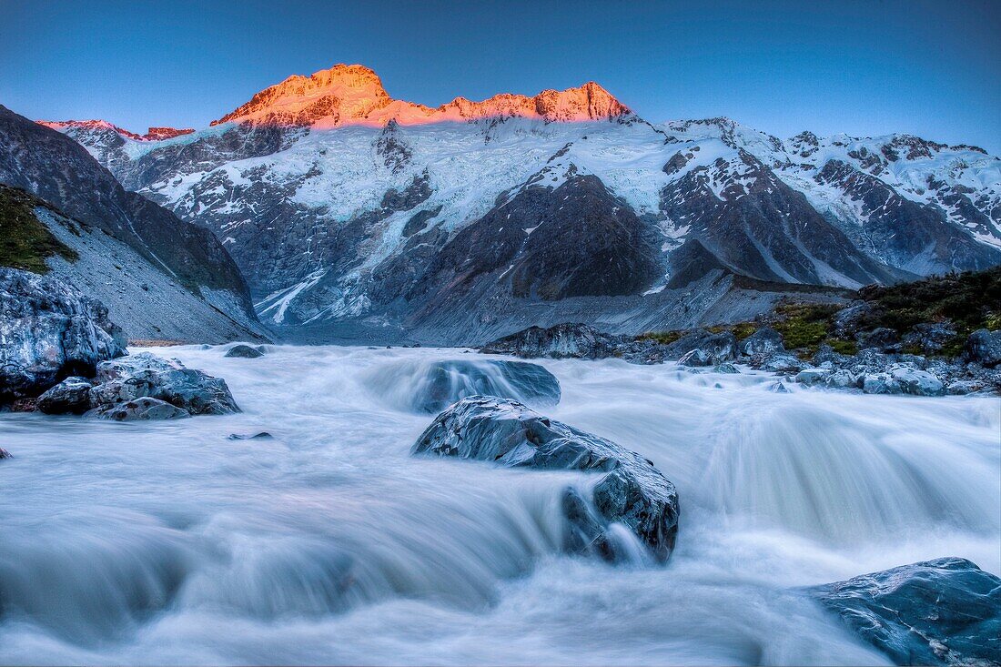 Mt Sefton at dawn, Hooker river flows from Mueller glacier, Mount Cook National Park, Canterbury, New Zealand