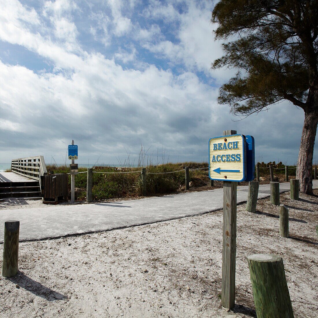 Sign pointing to beach access in Florida