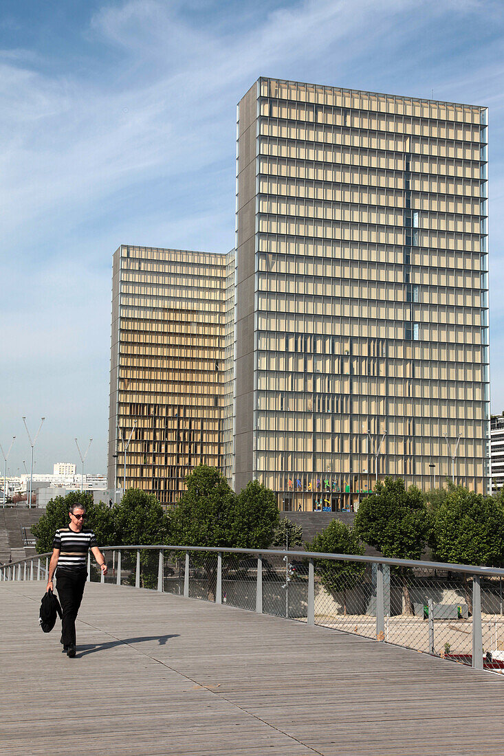 Passer-By On The Simone De Beauvoir Footbridge, Francois Mitterrand National Library Of France