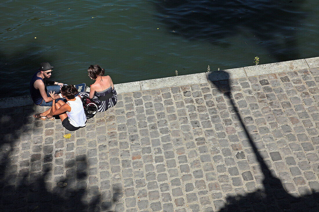 Relaxing By The Seine, Quay De Bourbon, Ile Saint Louis, Paris, France