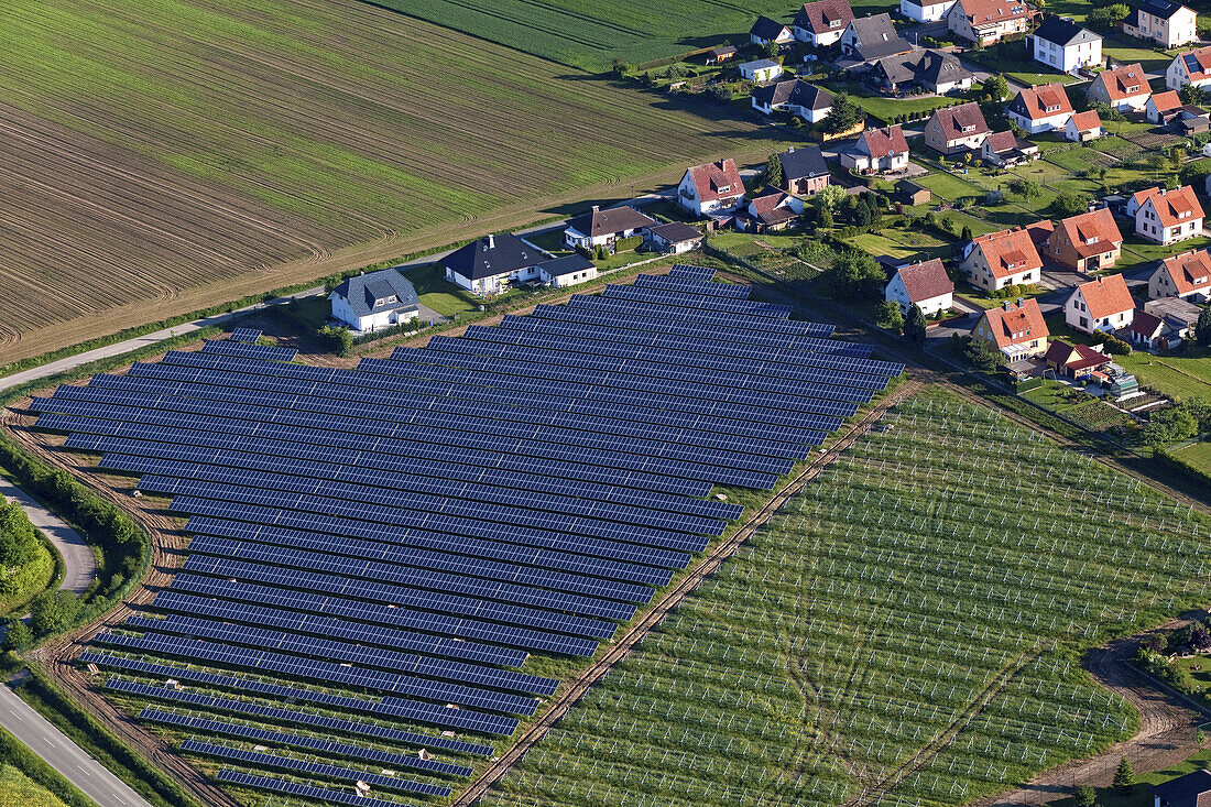 Aerial view of solar panels near Holzminden, housing settlement, Lower Saxony, Germany