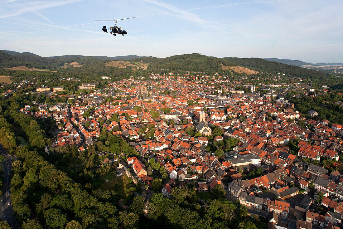 Gyrocopter above old town, Goslar, Lower Saxony, Germany