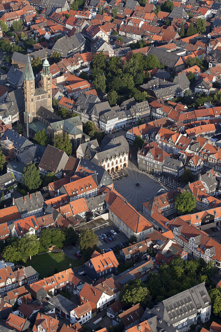 Aerial photo of the Church of St Cosmas and Damian, town hall and market square in the historic town of Goslar, Harz region, Lower Saxony, Germany
