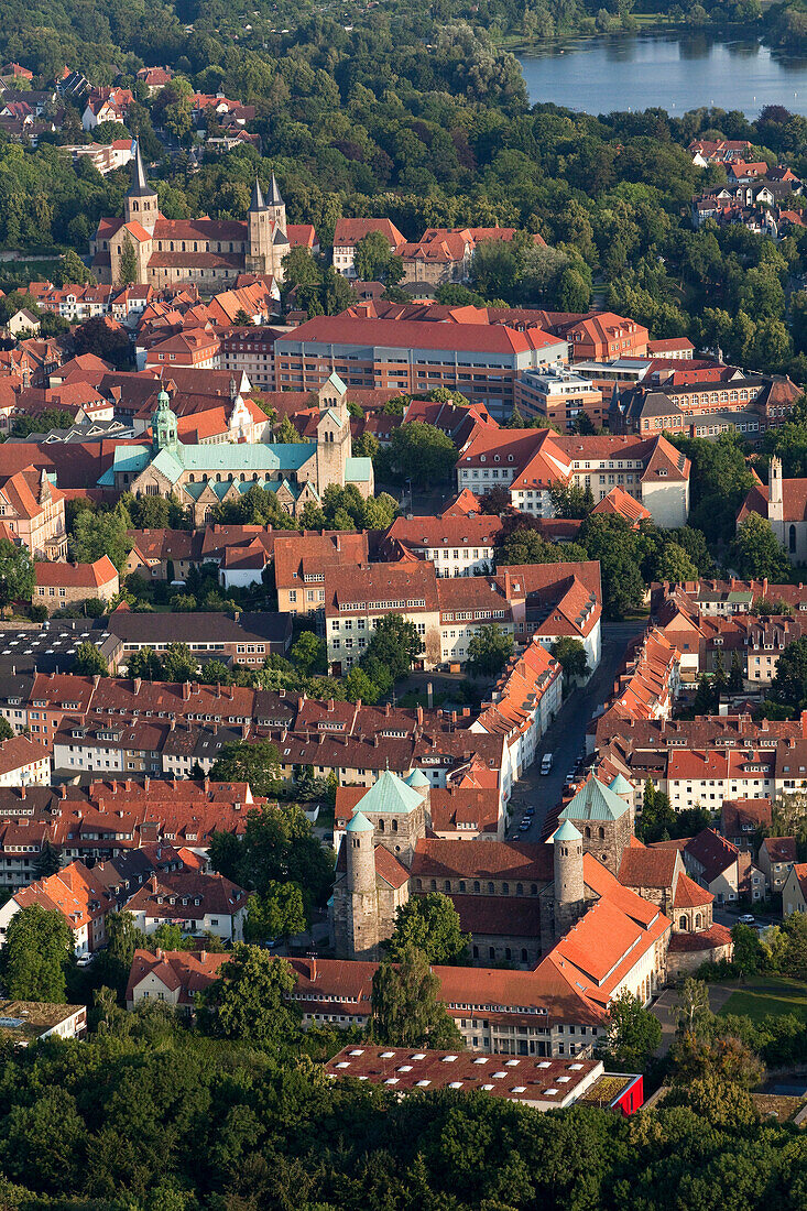 Aerial shot of old town with St. Mary's cathedral, St. Michael's Church and St. Godehard's Church, Hildesheim, Lower Saxony, Germany
