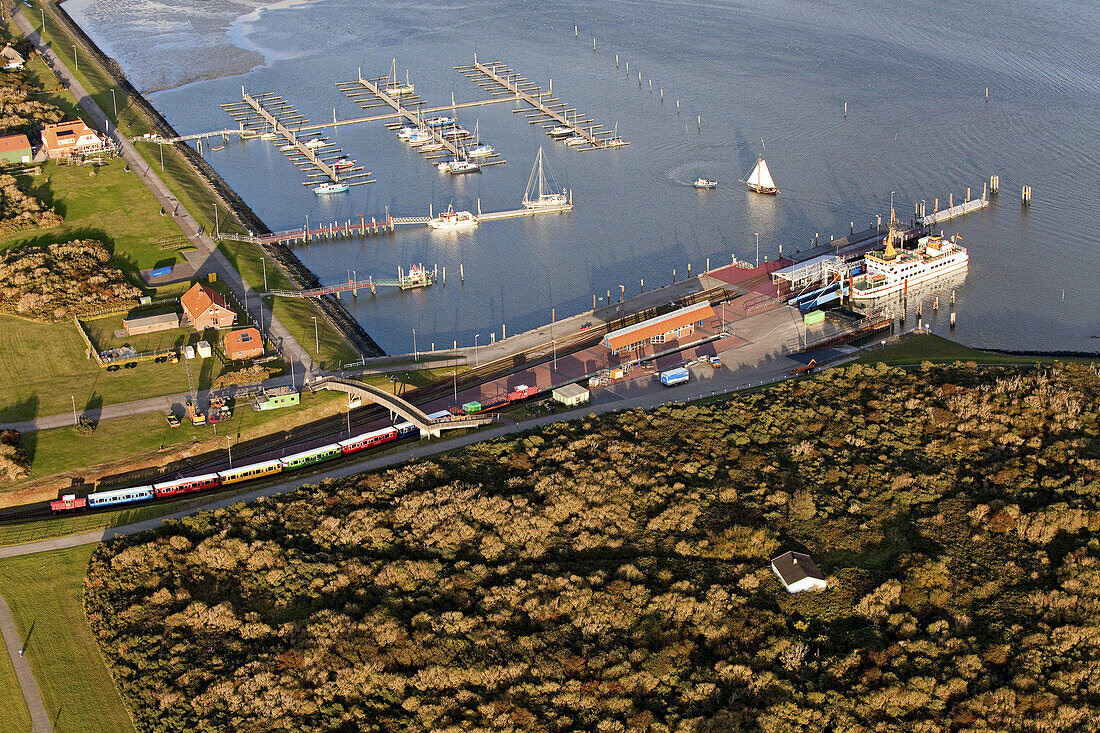 Aerial of ferry dock and island, East Frisian island, Langeoog, Lower saxony, northern Germany
