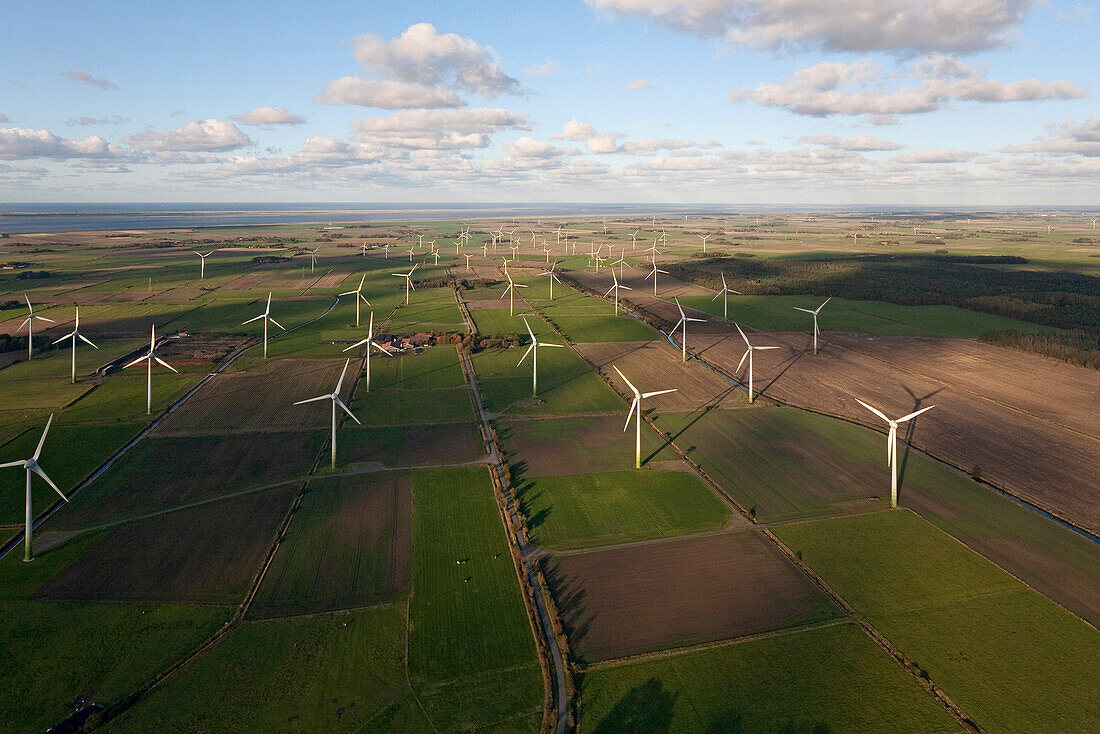 Aerial shot of wind farm on fields near Luetetsburg, Lower Saxony, Germany