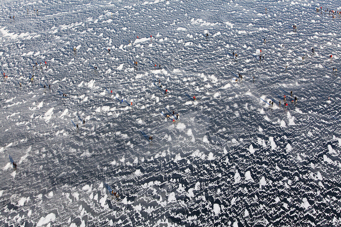 aerial of people on frozen Lake Steinhude in winter, Hannover region, Lower Saxony, Germany
