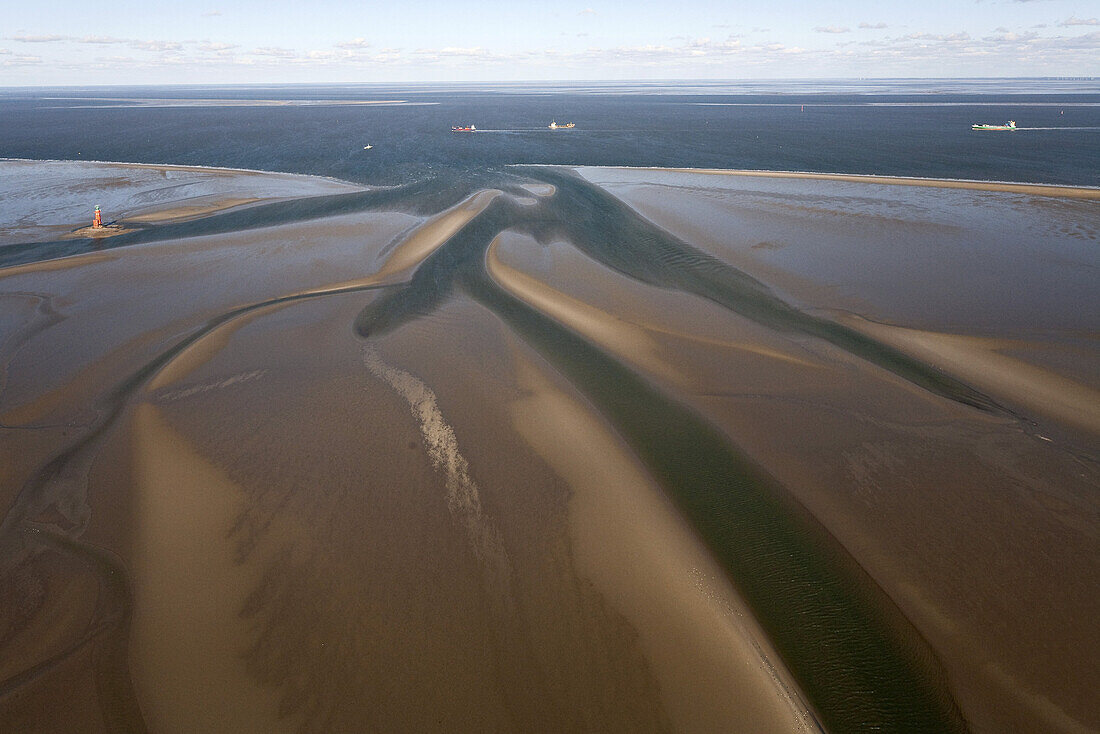 Aerial of sandbanks and lighthouse near the mouth of River Weser, Lower Saxony, Germany