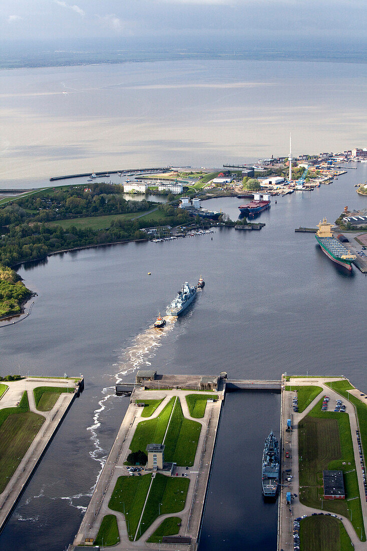 Aerial shot of warship in naval harbor, Wilhelmshaven, Lower Saxony, Germany