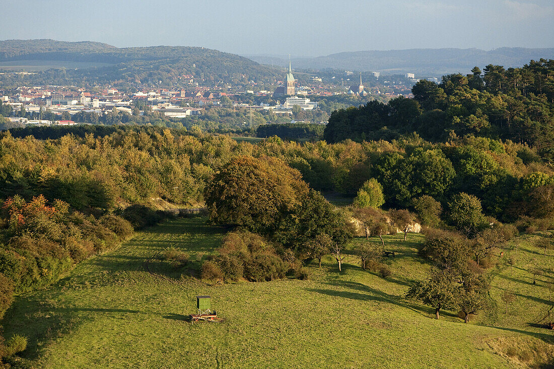 Aerial view of Hildesheim and surrounding forest and hills in the Autumn, Lower Saxony, Germany