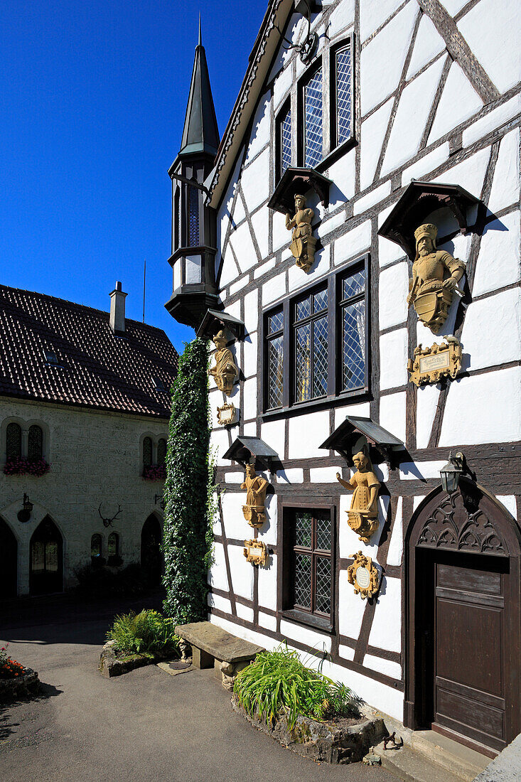 Half-timbered house in the courtyard of Lichtenstein castle, Swabian Alb, Baden-Wurttemberg, Germany