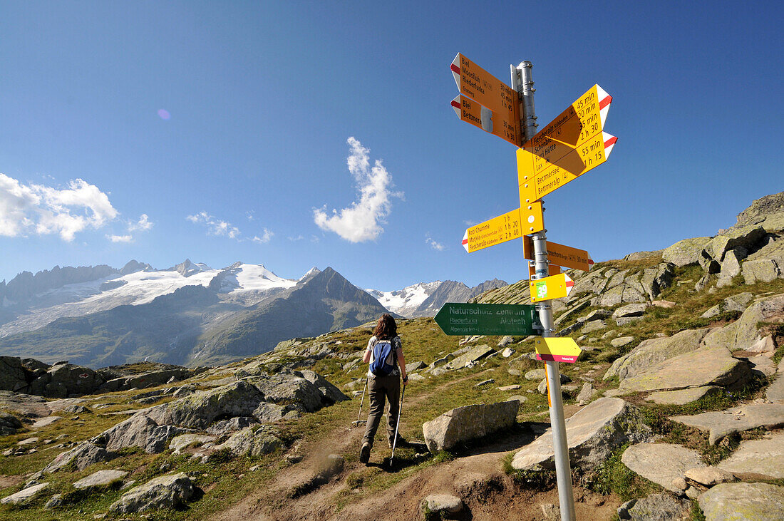 Woman mountain hiking, Bettmeralp, Canton of Valais, Switzerland