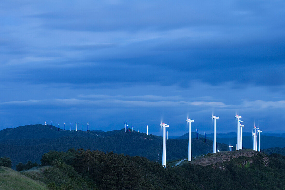 Wind energy plant under clouded sky, Alto del Perdon, Sierra del Perdon, Province of Navarra, Northern Spain, Spain, Europe