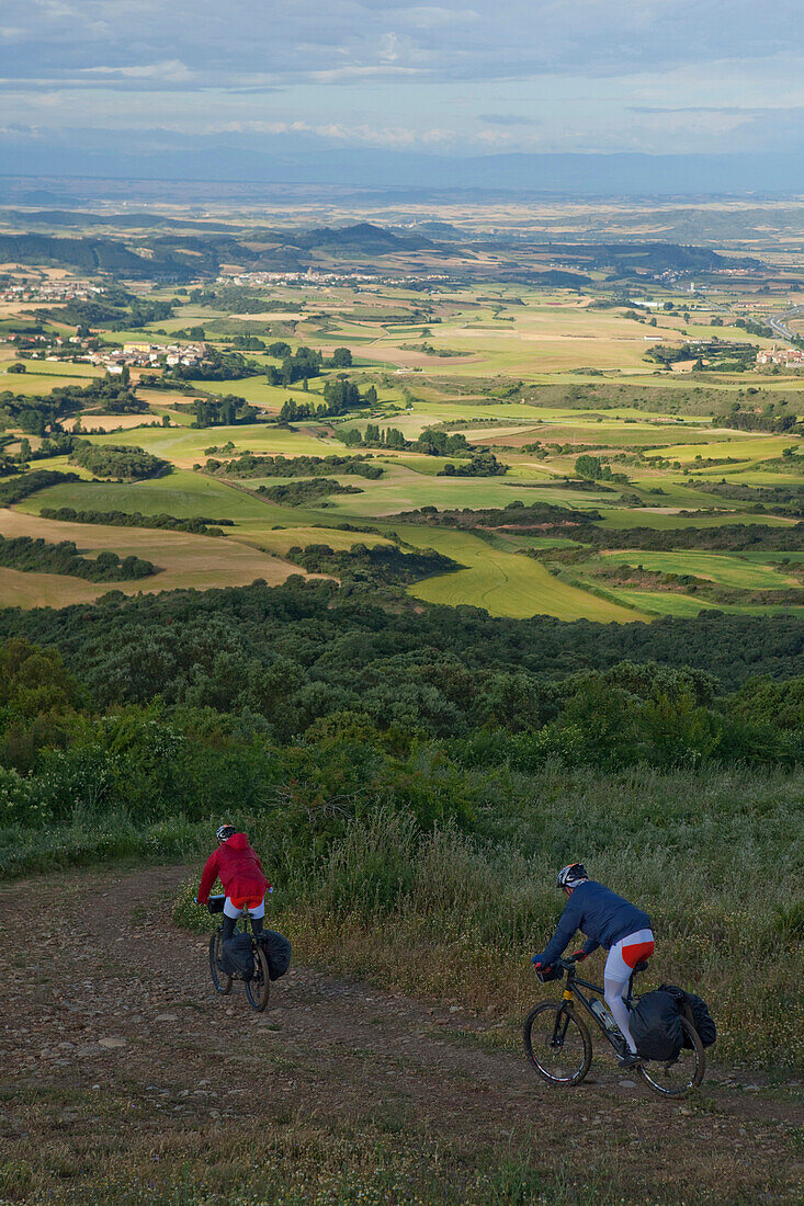 Pilgrims with mountain bikes, Uterga, Navarra, Spain