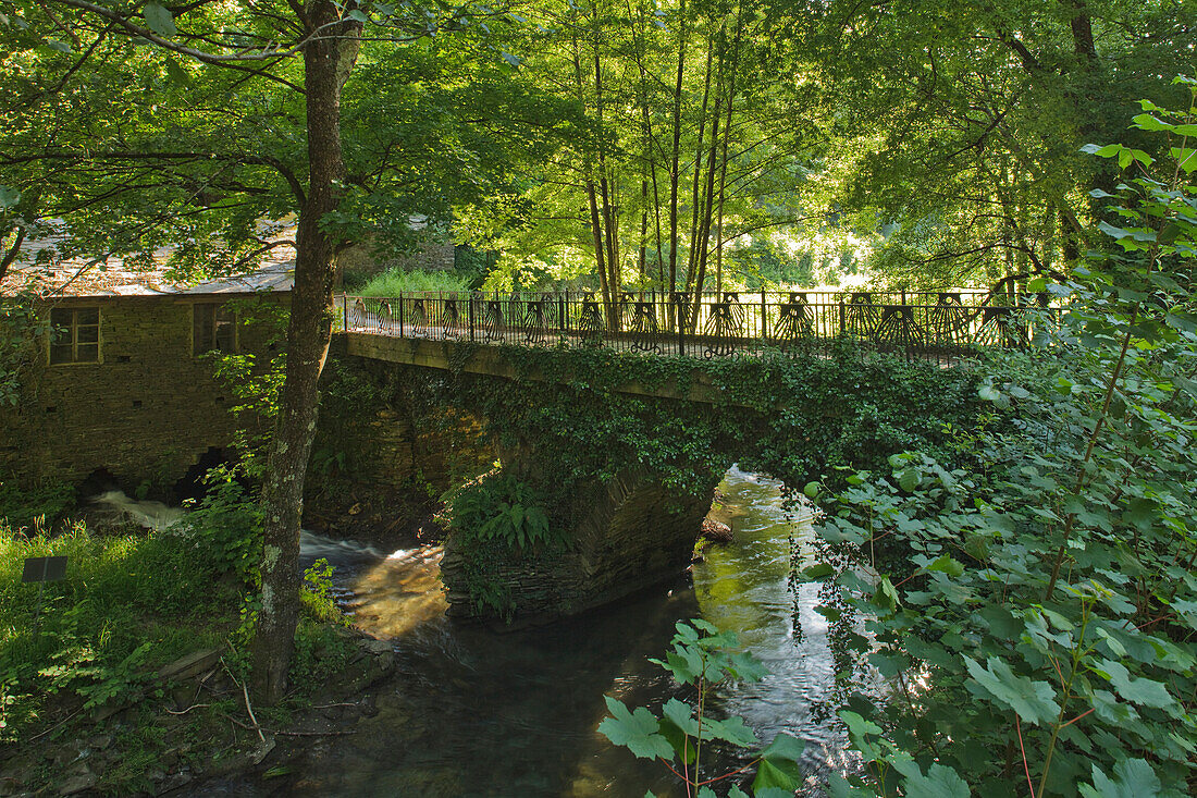 Old mill, brook and bridge near monastery of Samos, railing in scallop shape, Province of Lugo, Galicia, Northern Spain, Spain, Europe