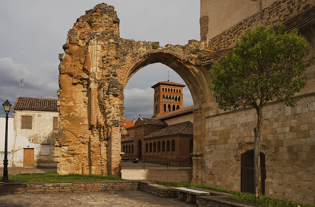 View through a gate at the church, Sahagun, Province of Leon, Old Castile, Castile-Leon, Castilla y Leon, Northern Spain, Spain, Europe