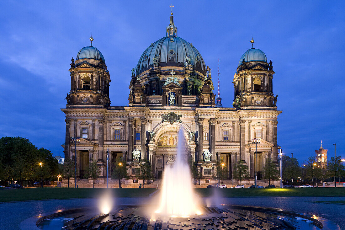 The illuminated Cathedral of Berlin in the evening, Berliner Dom and the Television Tower in the background, Berlin, Germany, Europe