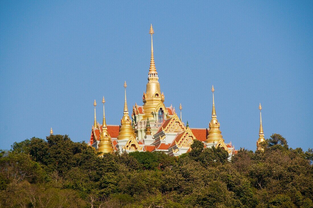 Golden Wat Tang Sai on Khao Tong Chai Mountain above Ban Krut Beach in Thailand