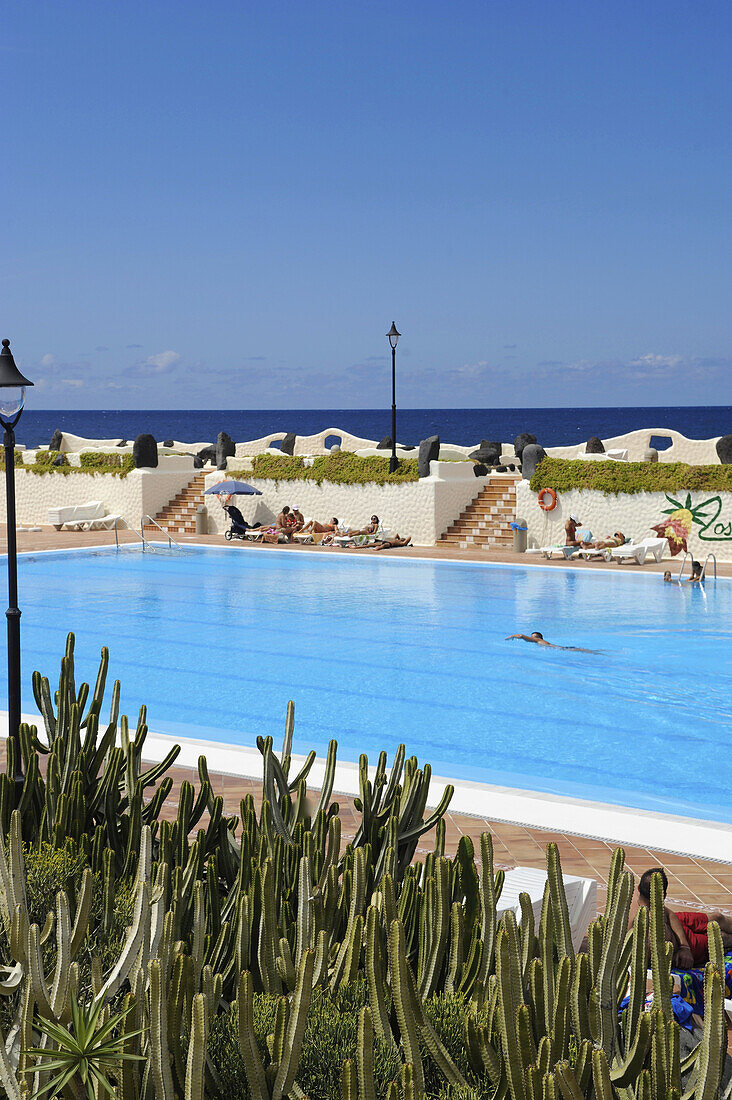 open-air swimming pool with cactus near the sea, Los Silos near Buenavista del Norte, Northwest Tenerife, Spain