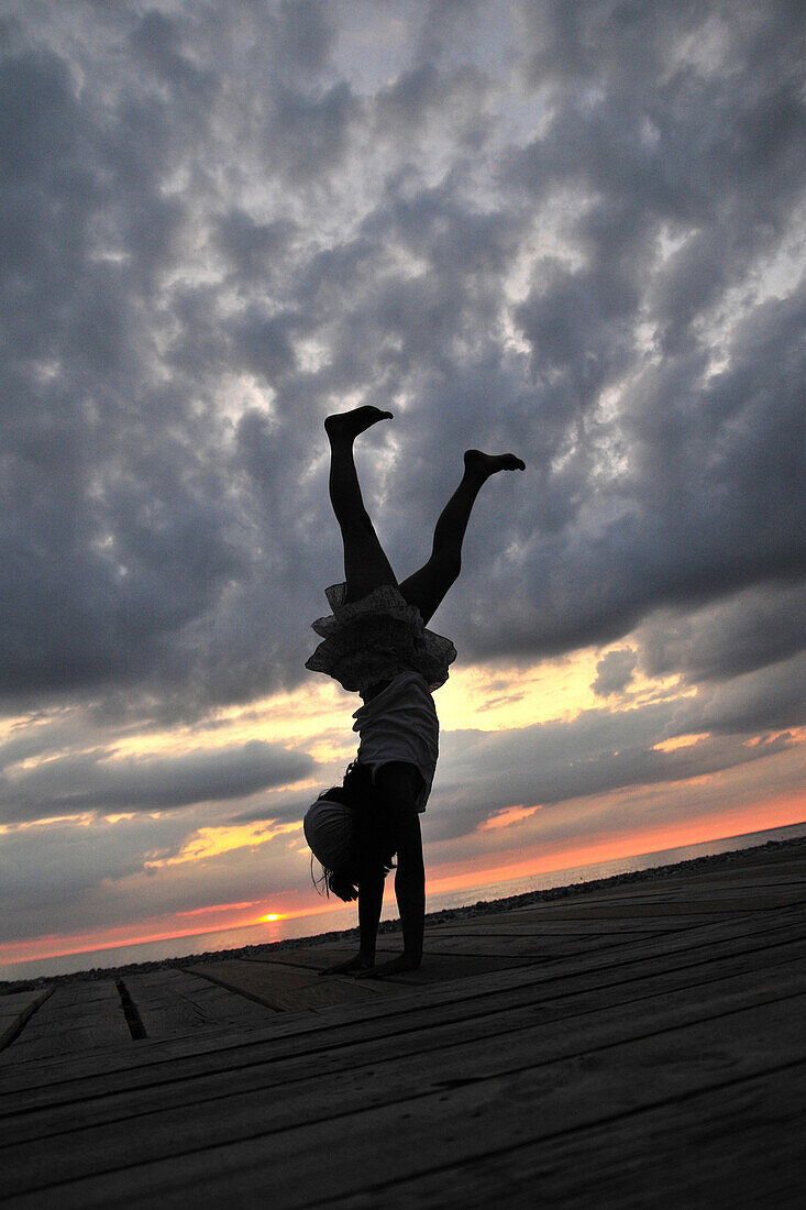 Silhouette Of A Little Girl At Sunset, Somme (80), Picardy, France