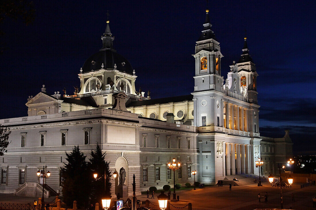 Night Shot Of The Neoclassical Facade Of The Cathedral Of La Almudena, Its Construction Started In 1883 By The Architect Francisco De Cubas, Madrid, Spain