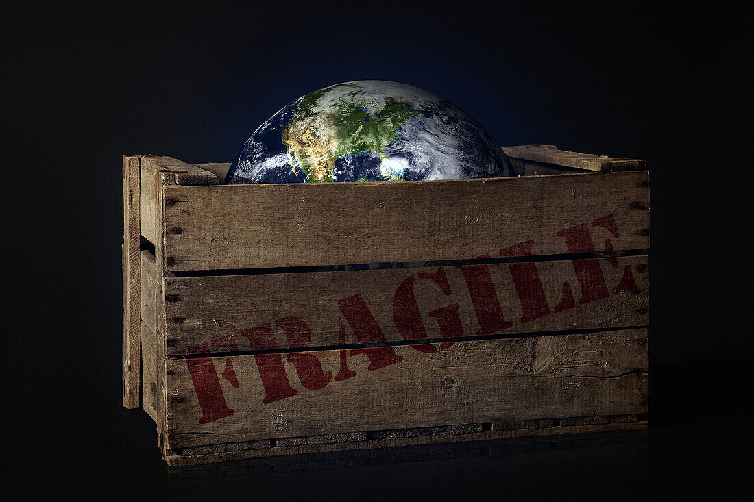 Packing Case Transporting The Earth In Transit, Illustration Of The Fragility Of The Planet, Photo Exhibition 'Fragile Earth' Presented By The Association 'L'Effet Colibri' France