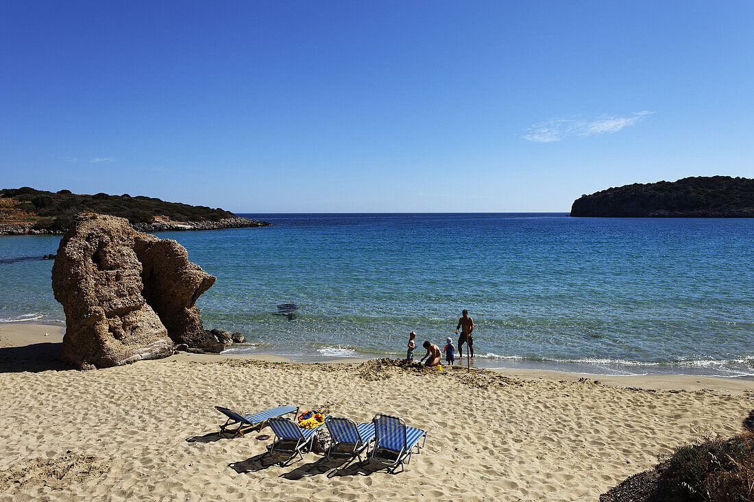 Family at beach, Mirabello Bay, Crete, Greece